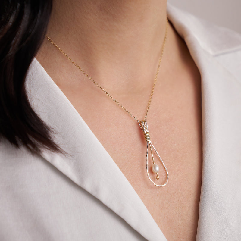 Guardian Angel Pendant | 14K Gold Artist Wire with Mirrored Sterling Silver | Lifestyle Shot | Ronaldo Designer Jewelry